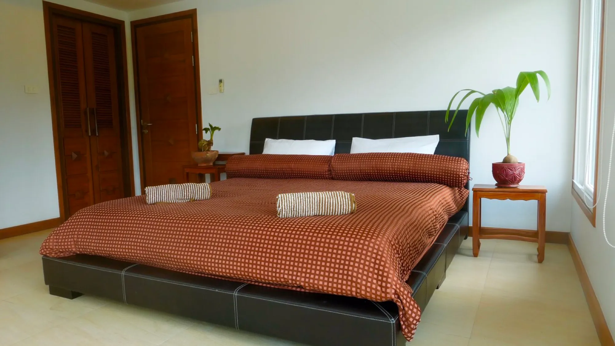 Main bedroom with the ridge visible through the window